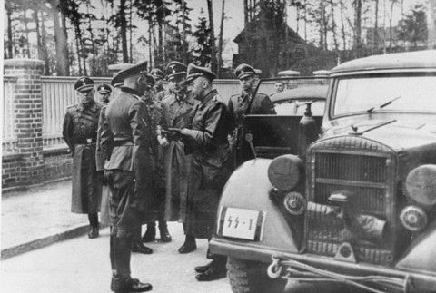 Reichsfuehrer-SS Heinrich Himmler greets SS Sturmbannfuehrer and camp commandant Max Pauly during an official visit to Stutthof